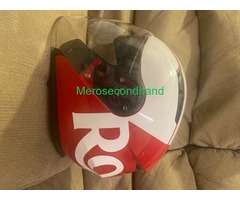 Helmet royal enfield new used once and after that never used perfect condition580 mm is the helmet