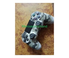 PS4 with controller +7games